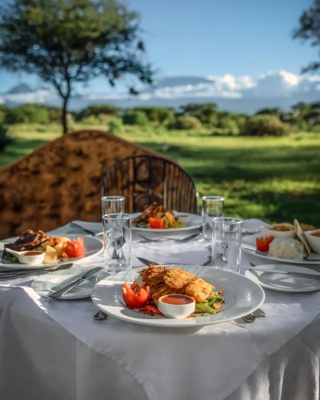 Dining with a view — Amboseli · Naivasha · Mara